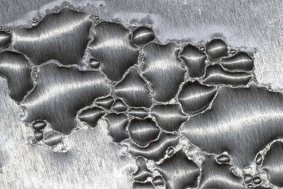 water condensation on an aluminum lid